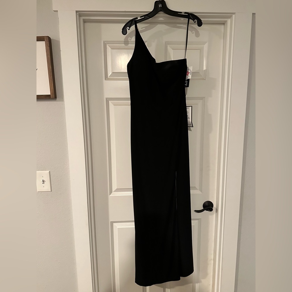 Xscape black evening gown.